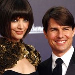 Katie Holmes and Tom Cruise look weird.